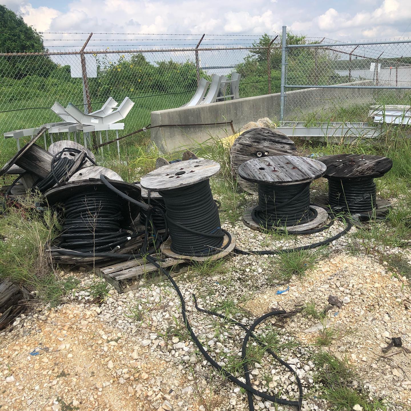 Large rolls of industrial cable and surplus material